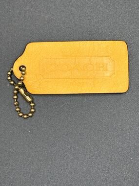 Yellow Leather Coach Hang Tag